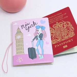 Pink cartoon passport cover with New York travel print and pink elastic closure strap