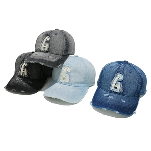 Distressed wash denim baseball cap with 3D letter H embroidery and ripped details