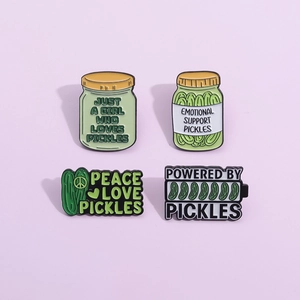 Set of 4 cute green pickle enamel pins with creative slogans on purple background