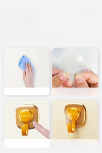 Detail showing 4-step installation process of golden bear adhesive wall hook