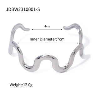 Detailed view of silver irregular wave cuff bracelet with 7cm inner diameter and 4cm opening