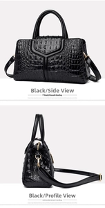 Detail view of black crocodile pattern faux leather tote with golden buckles and shoulder strap