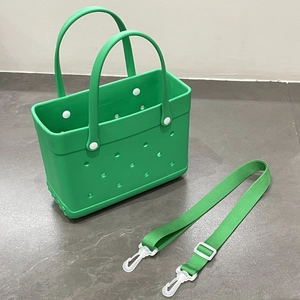 Green EVA beach tote bag with matching nylon shoulder strap and perforated hole design
