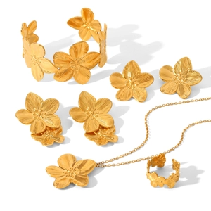 Golden stainless steel jewelry set featuring textured five-petal flower necklace and earrings