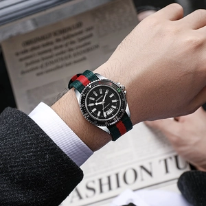Men's quartz sports watch with green-red canvas strap and black dial with calendar