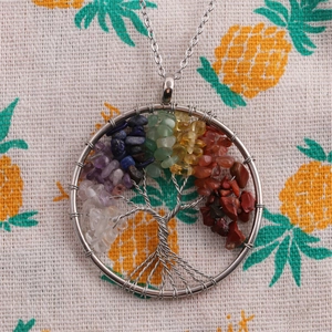 Silver tree of life pendant necklace featuring colorful crystal gravel and link chain
