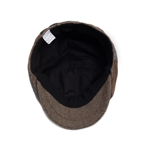 British style herringbone newsboy cap for men featuring interior lining and fabric labels