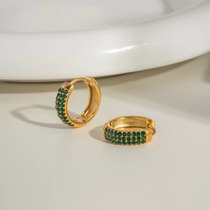 Detail of 18K gold stainless steel C-shape earrings with micro-pave green crystals