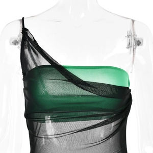Detail view of a black mesh one-shoulder top with green lining on a white mannequin