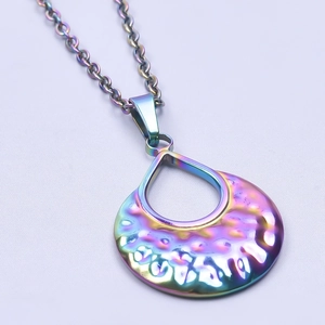 Close-up of rainbow teardrop pendant necklace with hammered texture in 18k vacuum plating