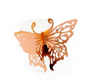Detail of laser-cut butterfly napkin ring in reflective gold for wedding decor