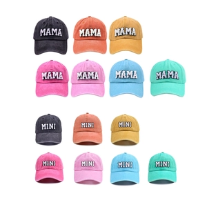 Matrix display of colorful washed cotton baseball caps with MAMA and MINI embroidery