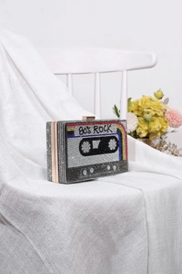 Detailed view of vintage cassette evening clutch with 80s Rock crystals and rhinestones