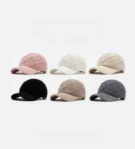 Close-up showcasing six colors of knitted baseball caps with 3D diamond texture