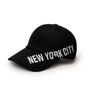 Detail of white 3D embroidery NEW YORK CITY on black twill fabric baseball cap
