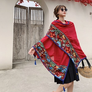 Ethnic red cotton linen shawl with floral embroidery and blue tassels for beach sun protection