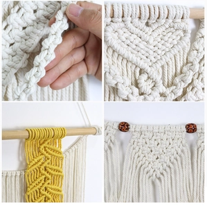 Detail of handmade macrame tapestry with ivory and yellow cotton rope weaving and tassels