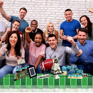 Detail of disposable green turf tablecloth with Touchdown text for football parties