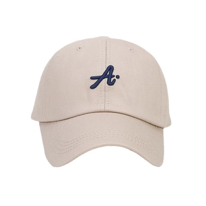 Classic beige cotton baseball cap with blue 3D embroidered letter A on a white background