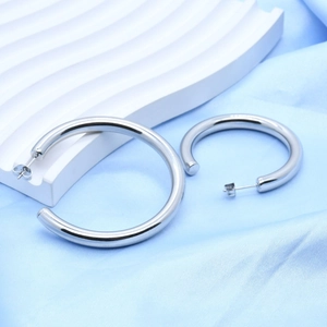 Polished silver stainless steel chunky C-shaped hoop earrings for women in minimalist style