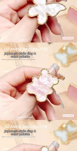 Nail art ring palette with gold-rimmed resin bear and butterfly faux agate designs