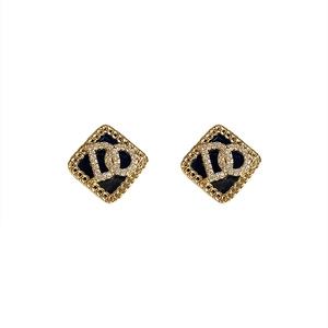 Boucles d'oreilles géométriques dorées avec émail noir et logo DG étincelant en cristaux