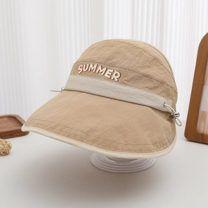 Detail of khaki sun hat with SUMMER embroidery and white contrast brim on stand