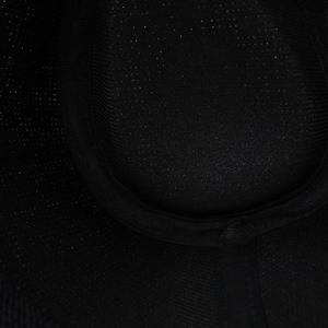 Detailed macro shot of high-density black woven fabric on a western outdoor sun hat