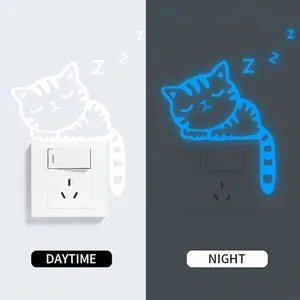 Glow in the dark sleeping cat light switch sticker with blue fluorescence effect