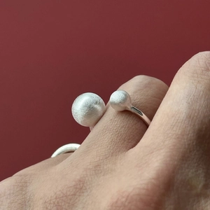 Minimalist 925 sterling silver open ring featuring brushed metal finish and dual spheres