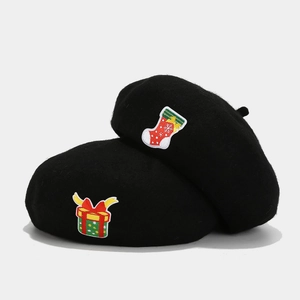 Classic black wool beret hats with festive Christmas embroidery of socks and gift boxes