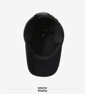 Detailed interior view of the thickened warm lining and ear flaps of the winter baseball cap