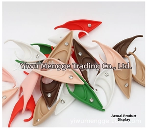 Macro detail of multicolored soft latex elf ears showing crystal rhinestone embellishments