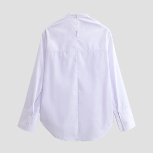 Back view of a white long-sleeved shirt for women with elegant bow and cuff details