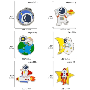 Set of six astronaut and space enamel pins with weight and size specifications