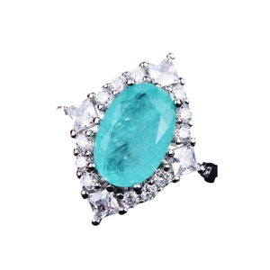 Teal oval gemstone ring with micro-paved halo of white zircon in a silver finish