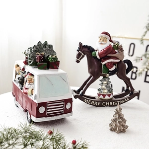 Miniature resin Christmas tree tabletop ornaments with a vintage red van and Santa Claus
