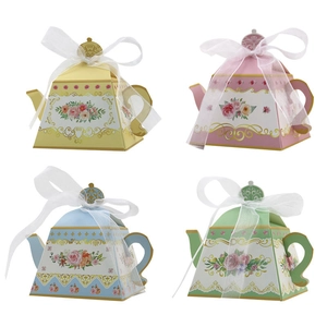 Floral teapot-shaped paper favor boxes in pastel colors with elegant organza ribbons