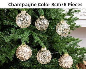 Detail of 8cm champagne Christmas balls with gold wire patterns on tree branches