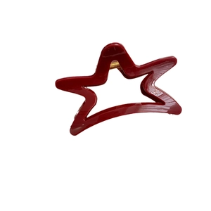 Elegant red star hair claw clip with glossy finish and durable gold metal spring