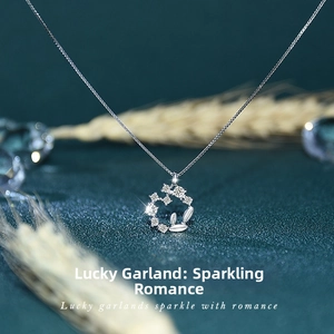 Macro shot of S925 sterling silver lucky garland pendant with zircon stones and leaves