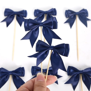 Dark blue ribbon bow cake topper for birthday party desserts and baking decoration