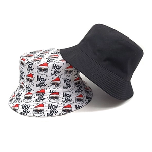Christmas Santa and snowflake print bucket hats in white and black cotton fabric