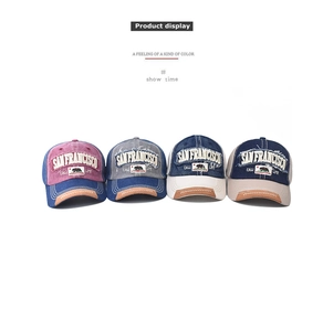 Detailed view of four vintage baseball caps with San Francisco embroidery and bear patch