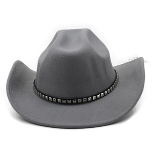 Detail of grey felt cowboy hat with black leather band and silver square studs