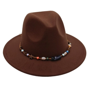 Detail of dark brown wool fedora hat featuring colorful beaded trim and floral wood accent