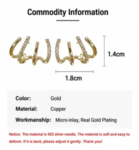 Detail view of gold-plated curved earrings with dimensions 1.8cm by 1.4cm and zircons