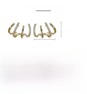Detail view of gold-plated curved earrings with dimensions 1.8cm by 1.4cm and zircons