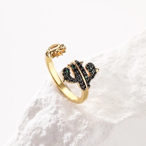 Asymmetric 18K gold-plated ring with sun-shaped zircon and cactus motif on stone base