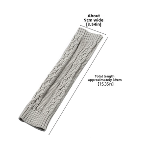 Detail of light grey knit leg warmer showing 39cm length and classic cable pattern